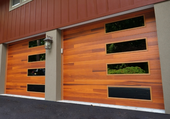 steel planks garage door in cedar